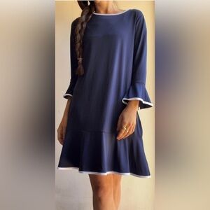 Michael. Michael Kors.  Navy dress with bell sleeves flutter hem